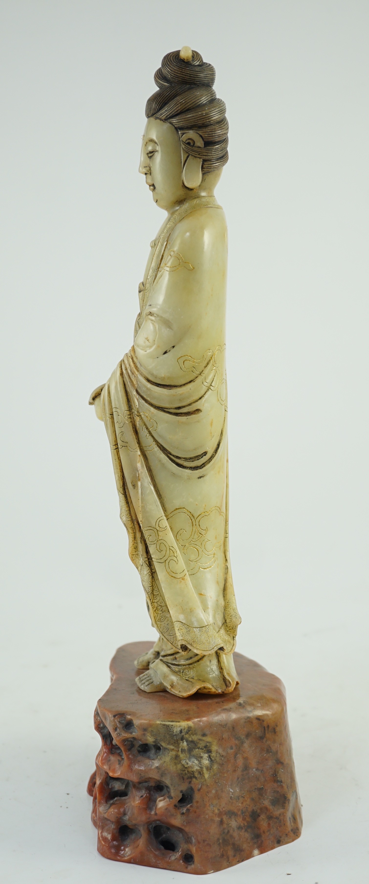 A Chinese soapstone standing figure of Guanyin, 19th century, 38cm high